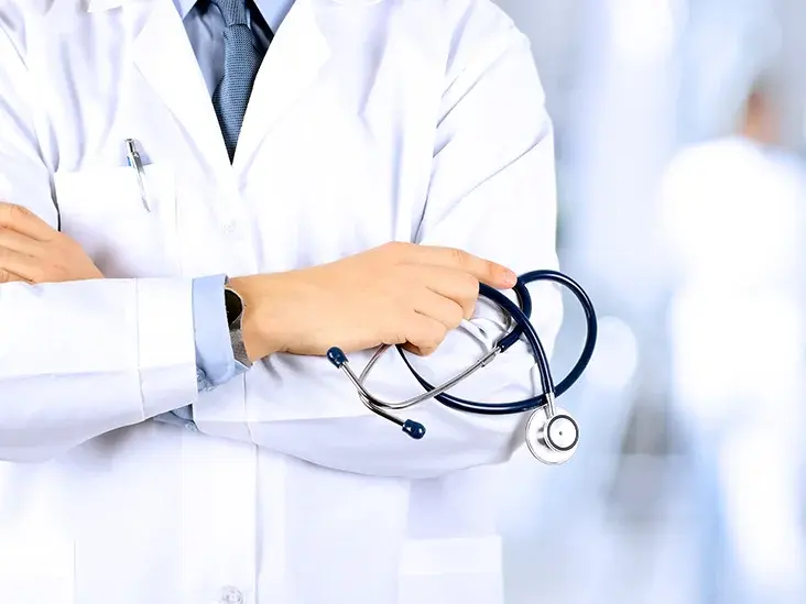Professional medical doctor with stethoscope